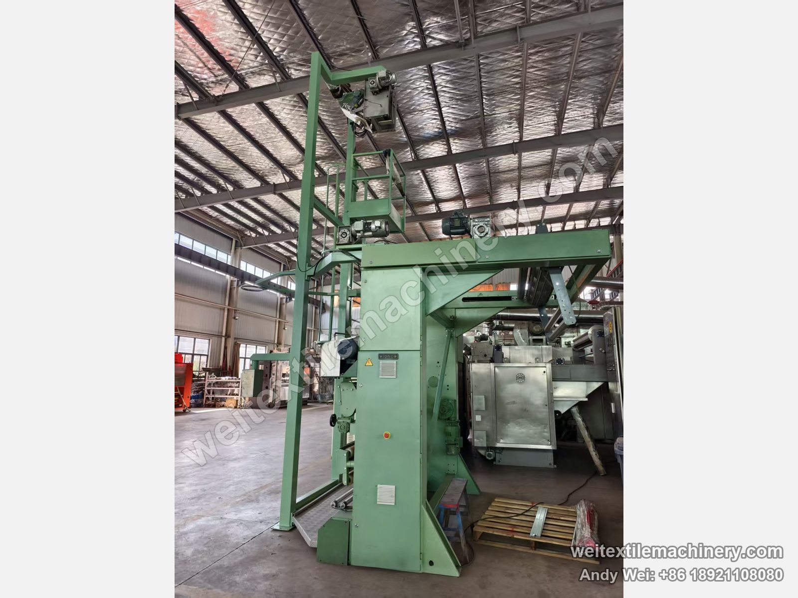Used Bianco untwisting and opening machine, end wall with cast bianco plate on the panel, two geared motors on top and service platform