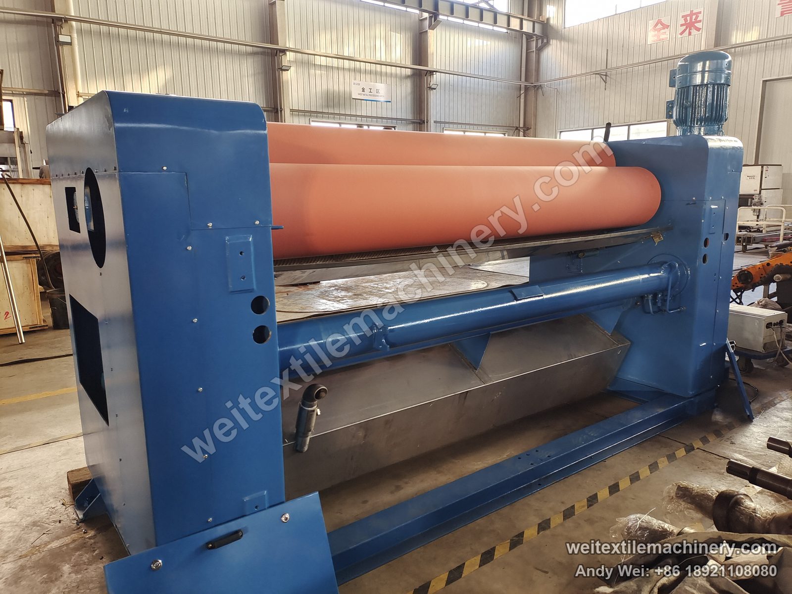Used Brückner squeezing machine (2.0 m, 2 rolls), front view with two-roll rubber nip, top motor and stainless trough