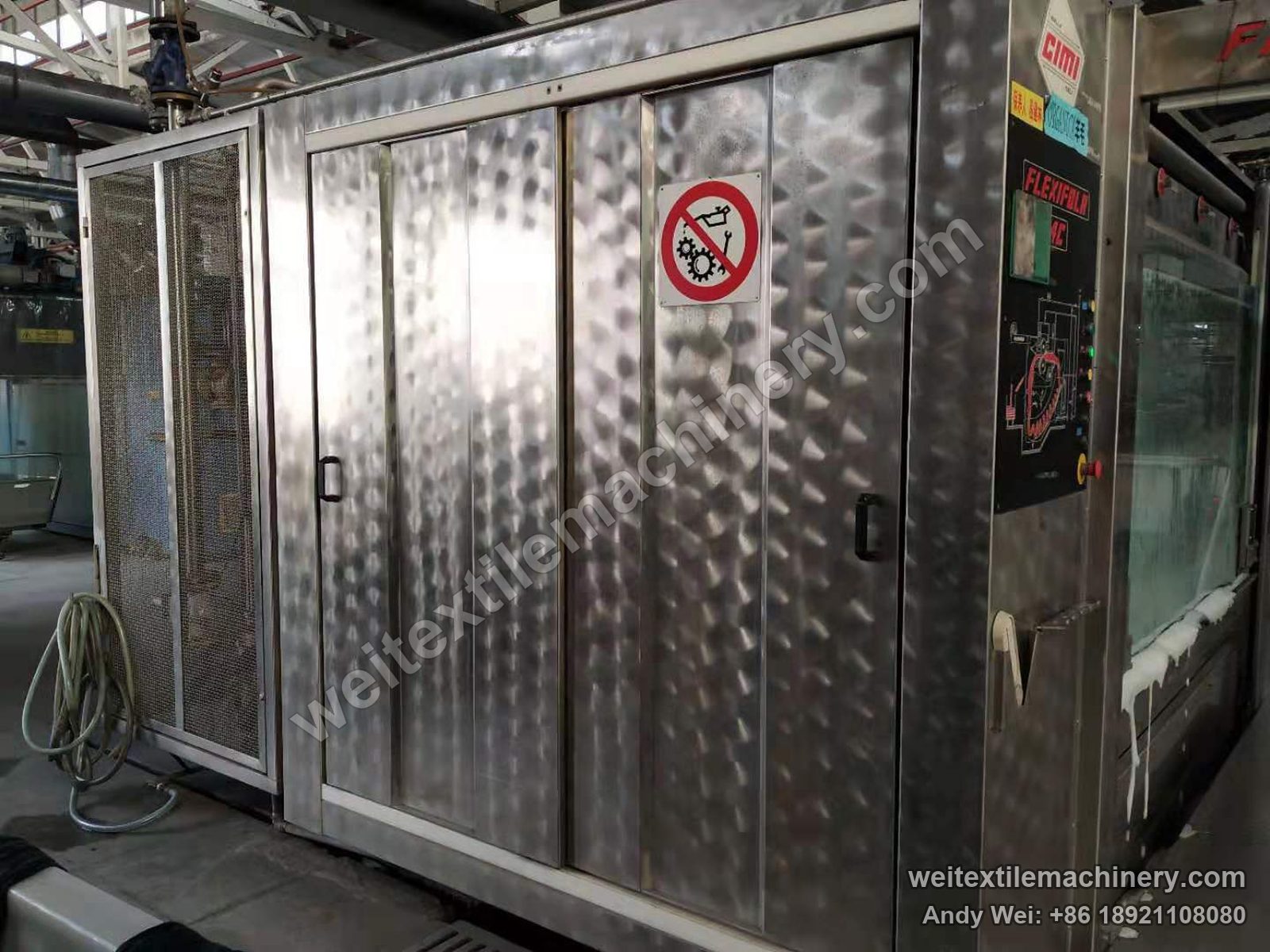Used CIMI Flexifola 4C rope scouring and milling machine, side view with stainless sliding doors, CIMI and Flexifola badges and control column