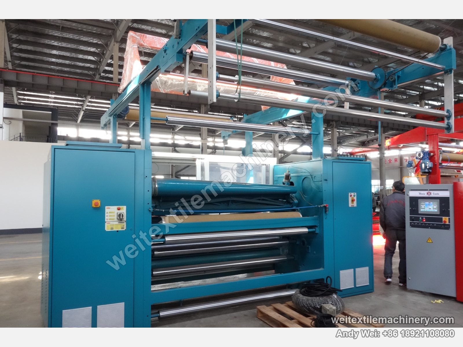 Used Lafer CMI 100 shearing machine (2.0 m), rear view with guide roll stack and overhead fabric frame