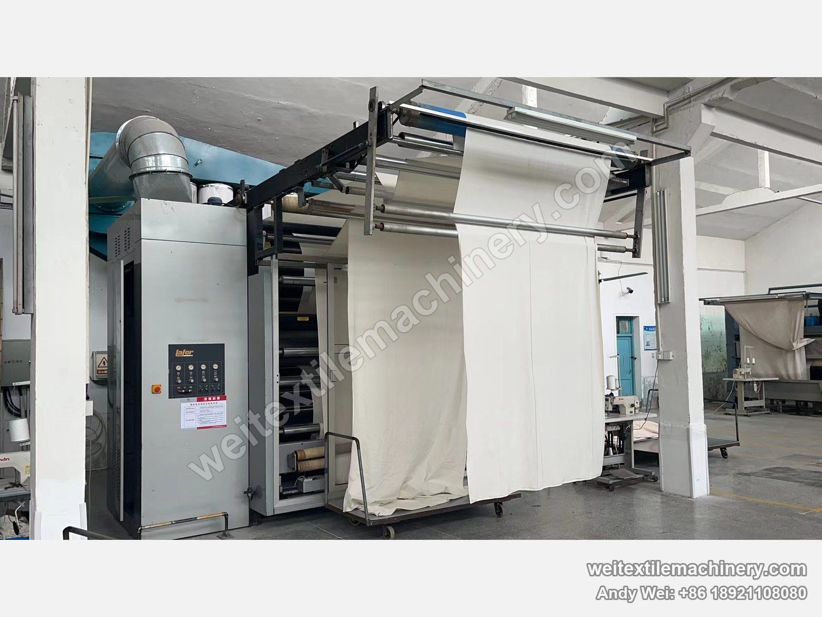 Used Lafer GRI 228 double drum raising machine, full view with grey cabinets, Lafer pneumatic panel, dust duct and fabric on the overhead frame