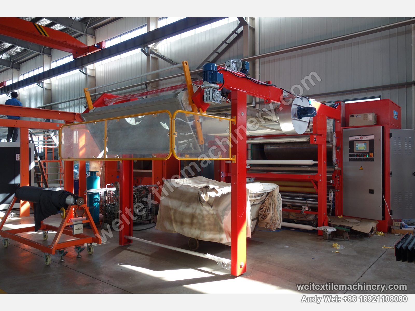 Used Mario Crosta DSS batch decatizing machine after QL rebuild, full view with red frame, clear guard, decatizing drum and Mario Crosta cabinet