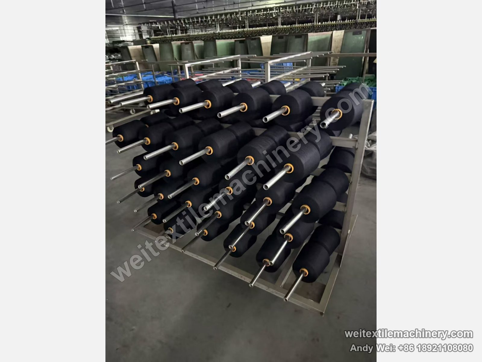 Used Obem VFPV vacuum yarn steaming autoclave, yarn trolley with spindles fully loaded with black cones