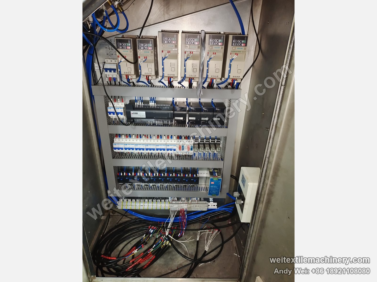 Used TMT STC 4D+4R wet brushing and setting machine, electrical cabinet with six Veichi inverters, PLC modules with SIMACHINE label and terminal rows