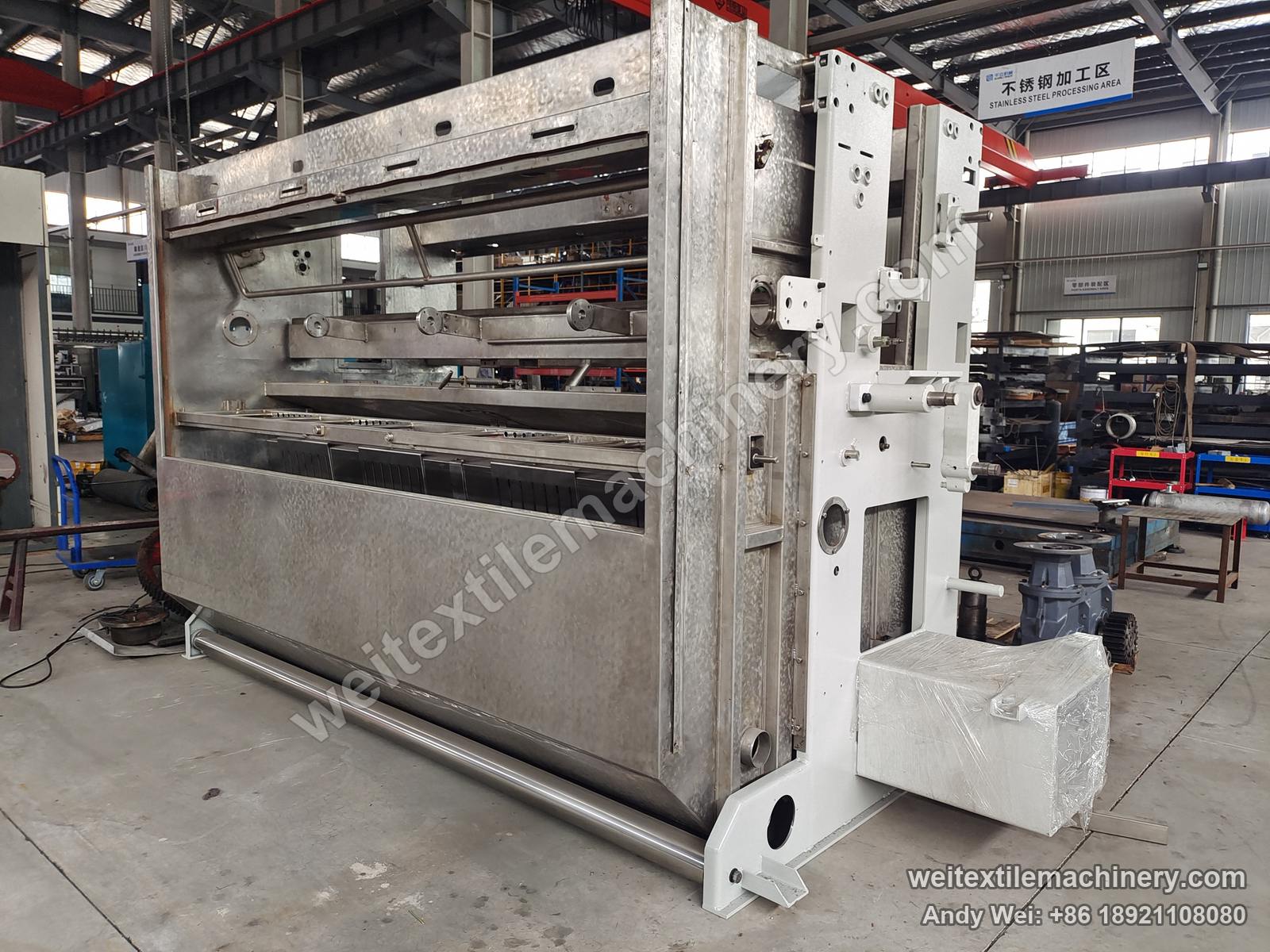 Used Zonco Flexicom 800 rope scouring and milling machine, other side with white end frame, stainless tank and removed rolls, QL stainless-steel area behind