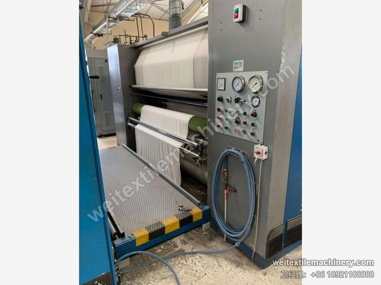 二手 Sperotto Rimar MD-M 连续蒸呢机（1.7 m）操作侧，白色织物绕辊、带仪表的按钮面板与格栅踏板
