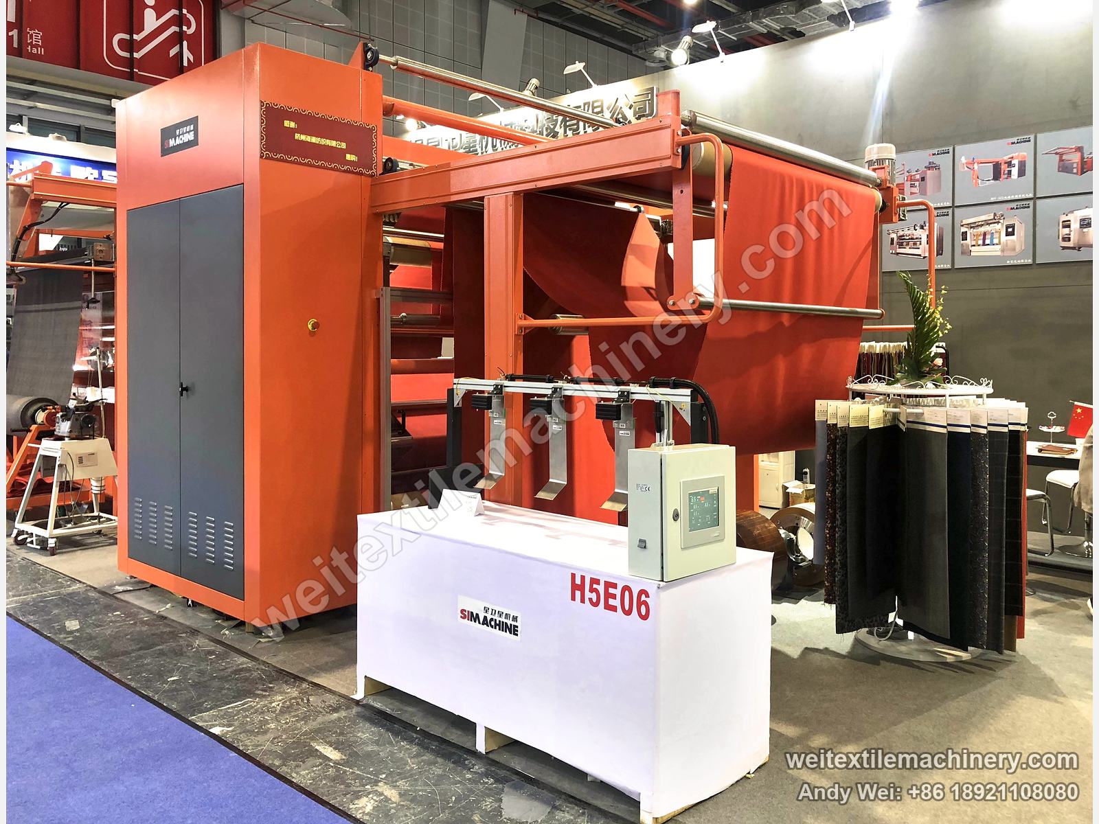 An orange double-cylinder teasel raising machine on the 2018 stand